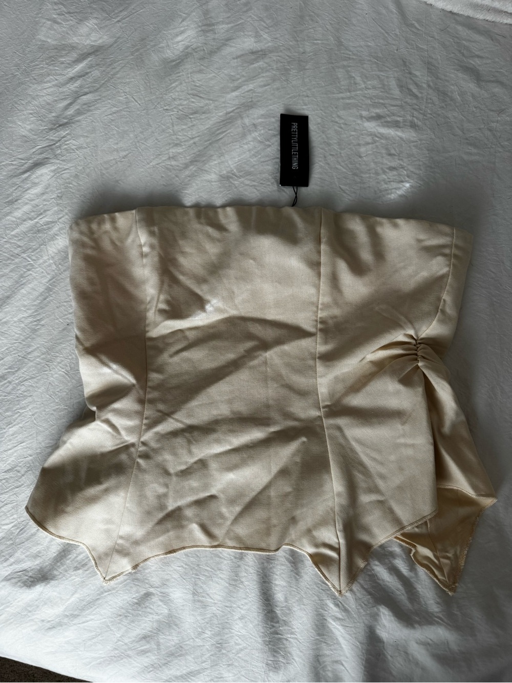 PrettyLittleThing Cream Asymmetrical Strapless Skirt